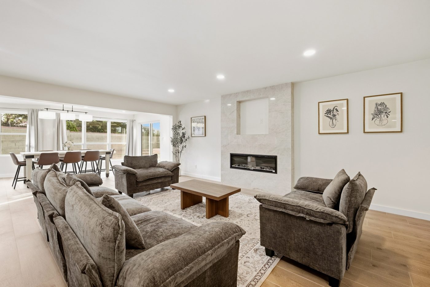 Renovated living room with a modern linear fireplace, Albuquerque